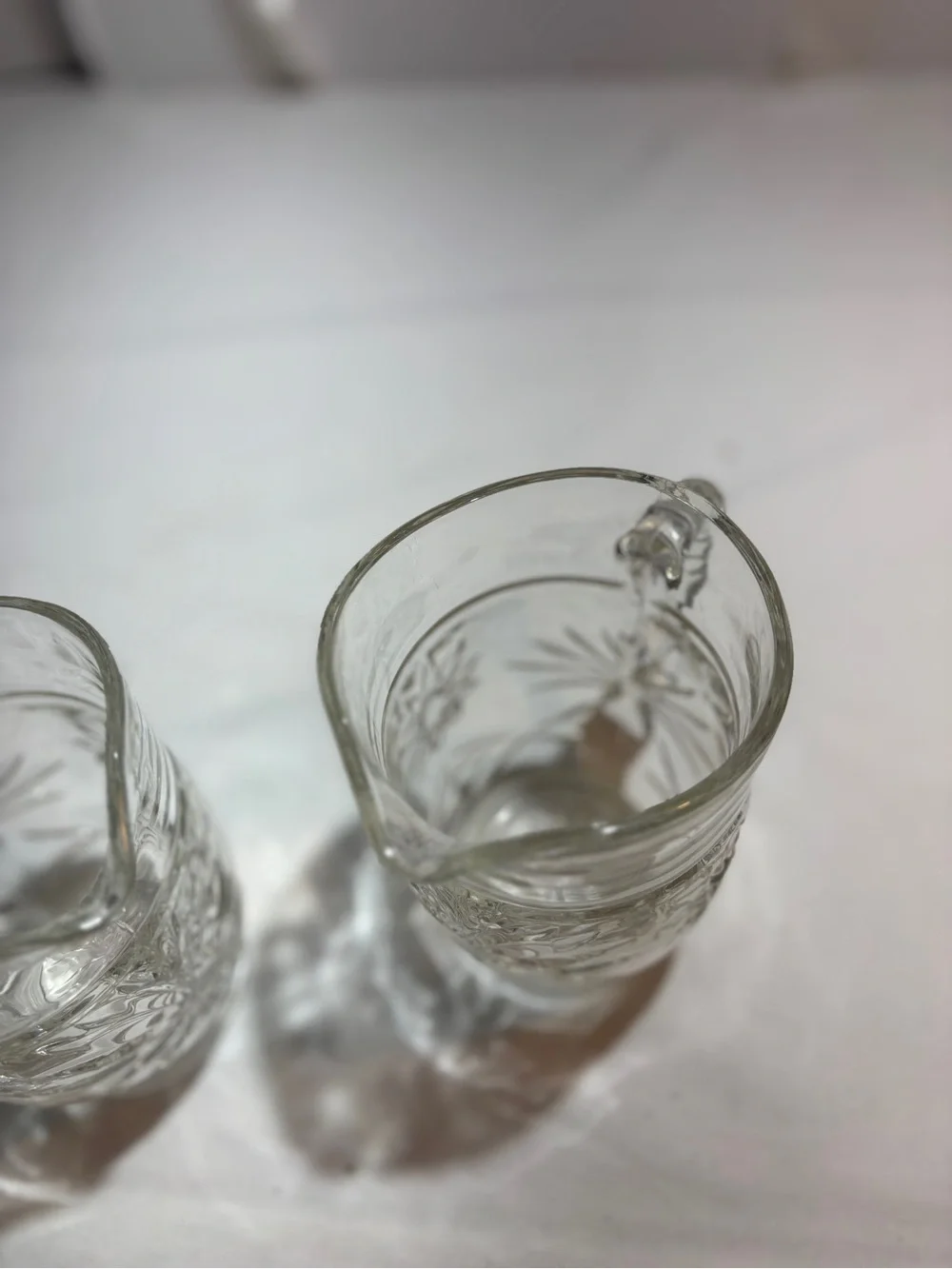 Clear Patterned Glass small pitchers  - Set of 2